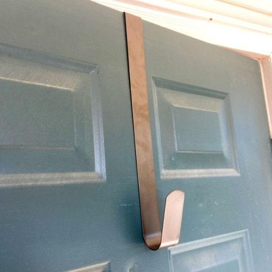 brown glossy metal wreath door hanger