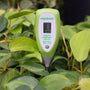 digital moisture meter for houseplants in use